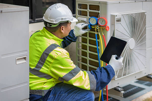 Professional Air Conditioning Repair technician working in Commerce, TX